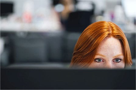 woman at computer desk