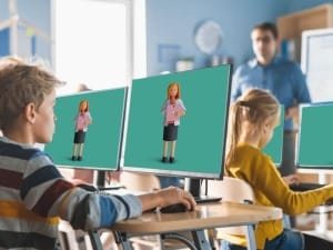 A ppicture showing children in a classroom with System C computer screens.
