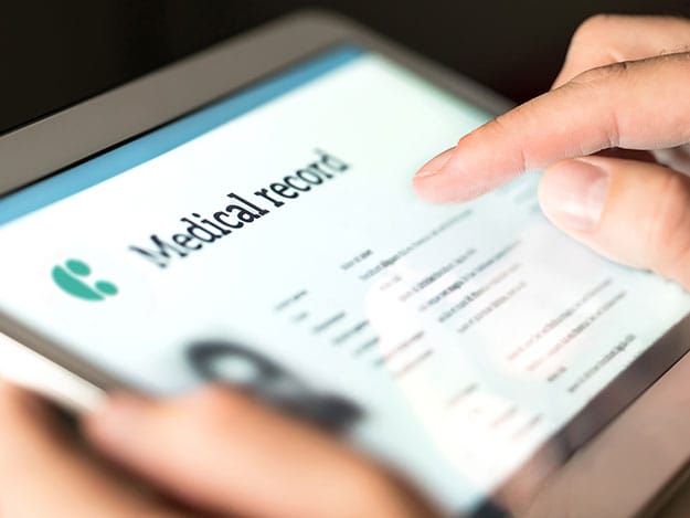 A picture of a System C electronic patient record on an iPad device.